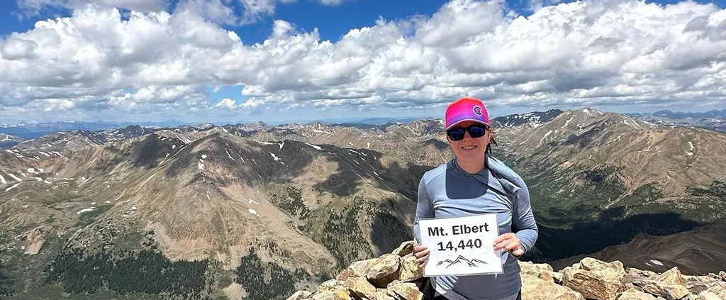 Stephanie Coppedge, CEO of Gideon Math & Reading at the top of Mt. Elbert