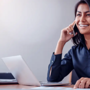 Woman recruiter talking on the phone with a franchise candidate.