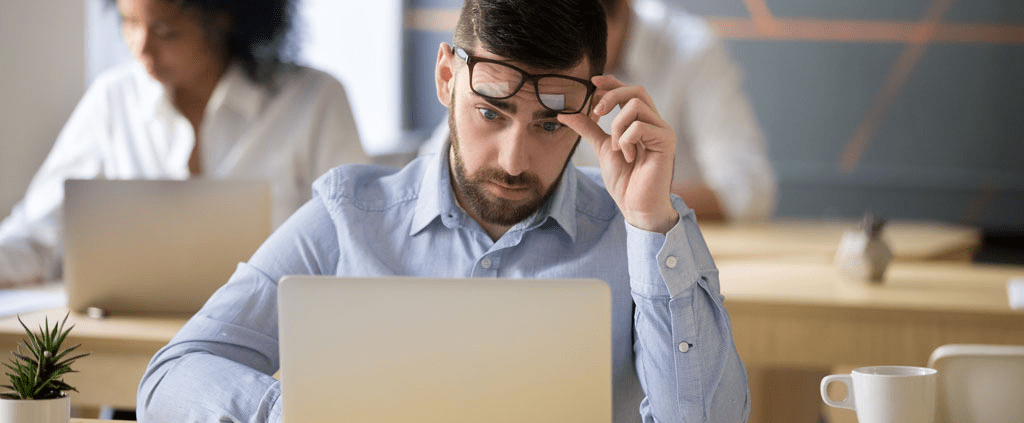 Man looking at a computer screen.